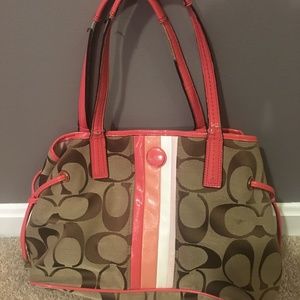 Coral and brown Coach purse